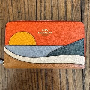 Coach Orange and Gray Leather Wallet with Sunset Design